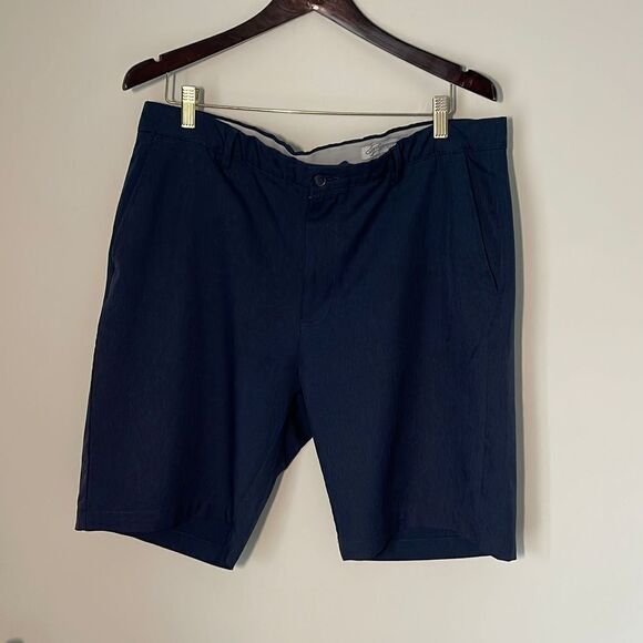 Mens Greg Norman Golf Shorts Blue. Size 38